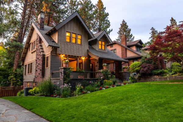 home during golden hour and lights turned on
